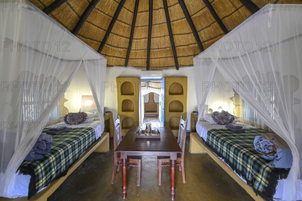 Round cabin, guest accommodation, Planet Baobab, lodge near the village of Gweta, interior view,