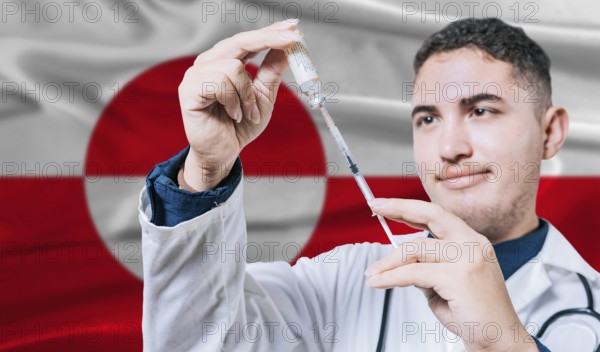 Doctor holding syringe on Greenland flag background. Medical professional holding syringe with