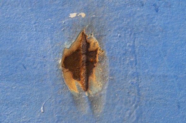 Rust spot on blue painted wall, Finland ferry Helsinki to Travemünde, chimney and loading area,
