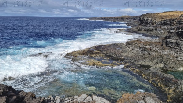 Rugged coastal area with thundering waves, rugged rocks and sweeping views over the sea, Yaiza