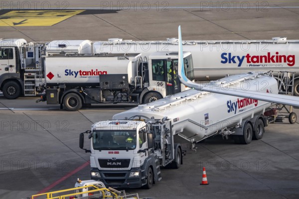 Refueling an aircraft after landing, in front of takeoff, air fuel, kerosene, Skytanking tank truck