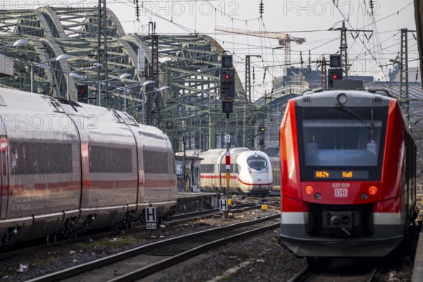 Rail track in front of Cologne Central Station, Hohenzollern Bridge across the Rhine, ICE