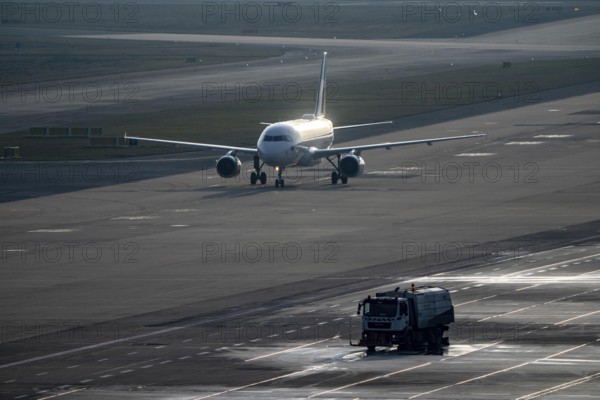 Eurowings Airbus after landing on the taxiway to terminal, at Cologne/Bonn airport, CGN, road