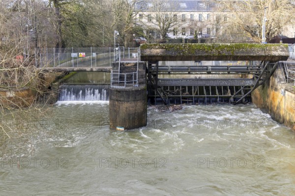 River Sluice Gate flood defence system in operation on River Avon, Chippenham, Wiltshire, England,