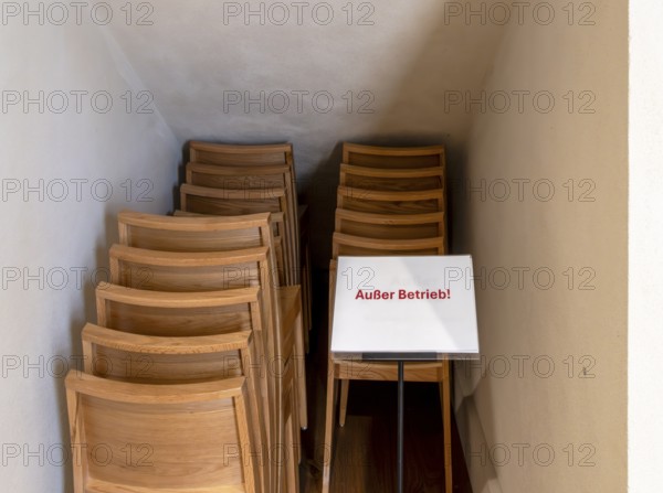 Stacks of wooden chairs in the restored and reopened garrison church in Breiten Straße, Potsdam,