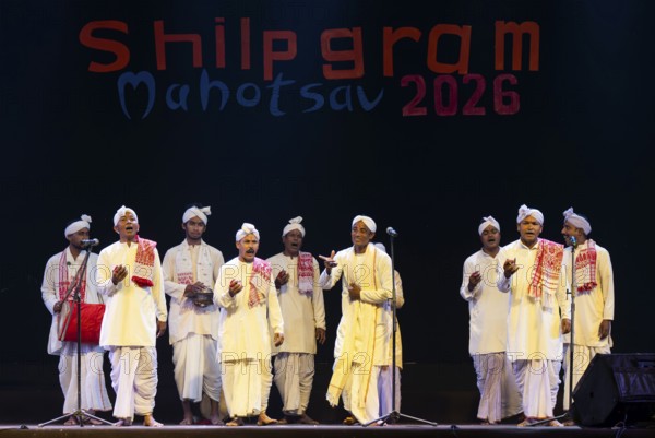 Artists perform 'Ojapali' folk song during a cultural evening program at Shilpgram Mohotsav 2026 in