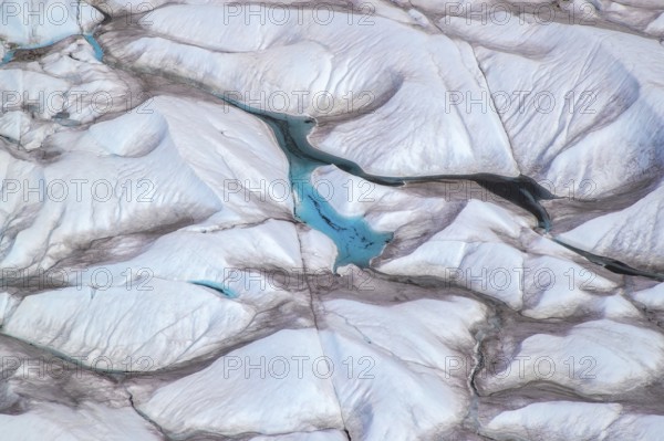 Aerial view of meltwater on the Greenland ice sheet, Arctic landscape, frozen wilderness, glaciers