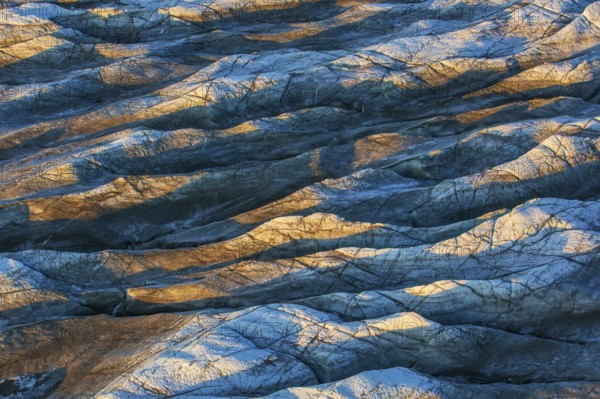 Aerial view of Ice sheet in Greenland, Arctic landscape, frozen wilderness, glaciers and