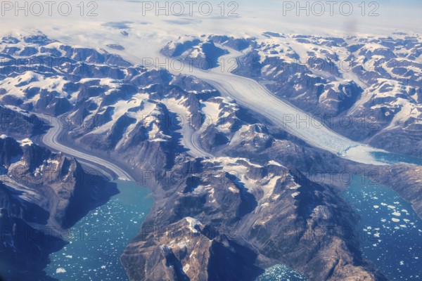 Aerial view of Greenland ice sheet, Arctic landscape, frozen wilderness, glaciers and snow-covered
