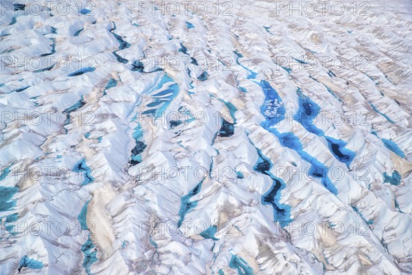 Aerial view of meltwater on the Greenland ice sheet, Arctic landscape, frozen wilderness, glaciers