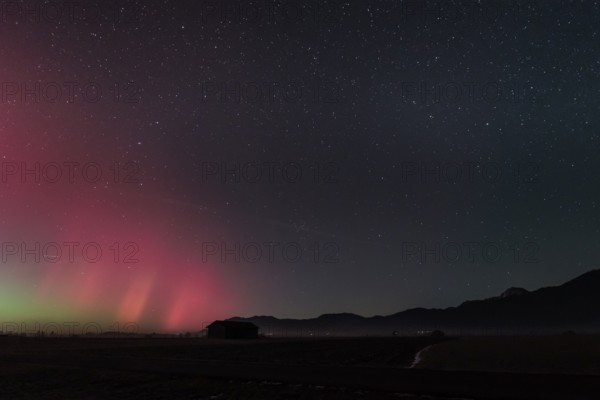 Northern lights, aurora borealis, solar storm, January 2026, red, green, hut, Loisach-Lake