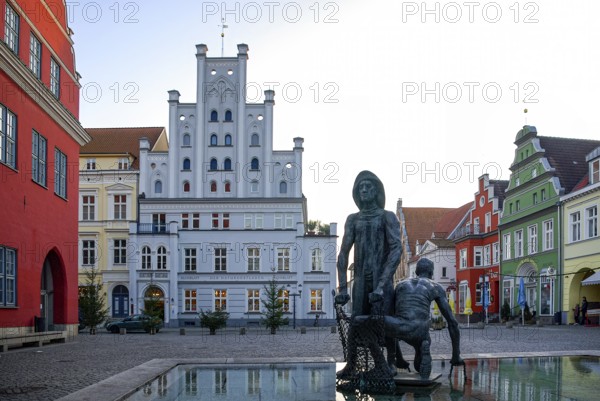 Fishing fountain with sculptures by Jo Jastram at the fish market in the Hanseatic city of