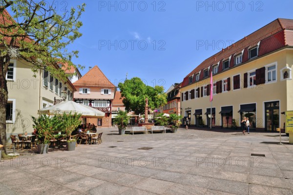 Ettlingen, Germany - August 13th 2025: Fountain at Ettlingen Schlosplatz town square on a sunny day