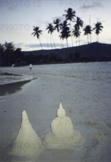 Children built a pagoda and a Buddha out of sand on the beach, Buddhism, religion, Koh Samui,