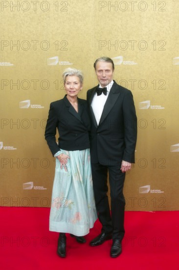 Mads Mikkelsen with woman Hanne Jacobsen, EUROPEAN FILM AWARDS Berlin 2026, photo call at the House