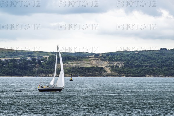 Boats over Hurst Point Lighthouse and Hurst Castle, Hurst Spit, Milford on Sea, Lymington,
