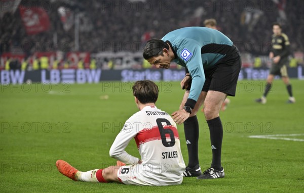Referee Deniz Aytekin attends to Angelo Stiller VfB Stuttgart (06) injured Injury MHPArena, MHP