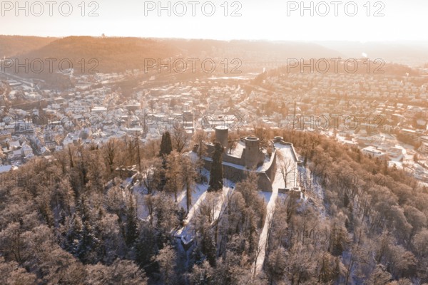 Panorama of a snowy town with a castle on a hill in the foreground, Nagold, Calw district, Black