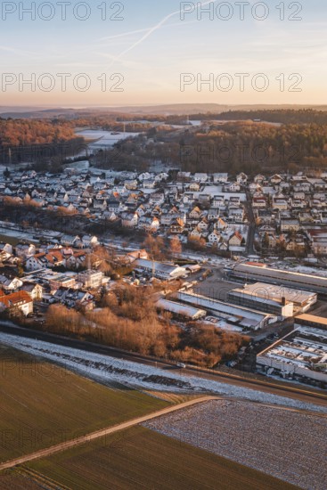 Wintery urban landscape with fields and roads at dawn, quiet atmosphere, Althengstett, Calw