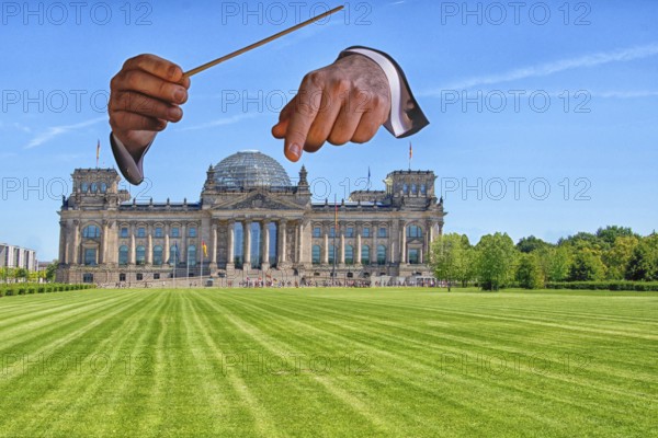 Conductor hands and Reichstag building. Who conducts whom here? Plenary area Reichstag building,