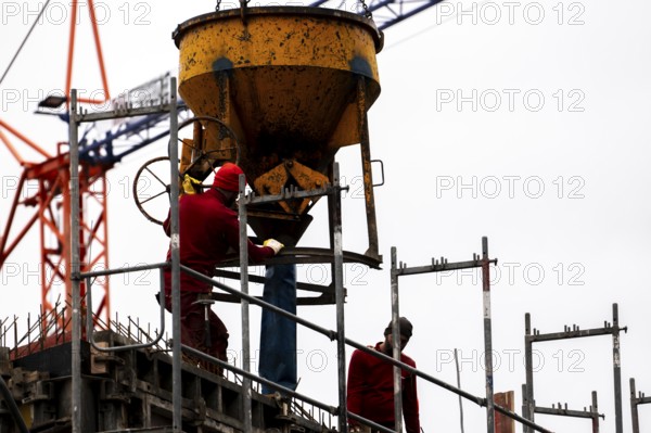 Construction site, concreting work, on a large construction project, apartments and commercial