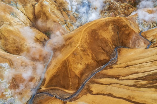 Aerial view of the misty geothermal landscapes of Hveradalir, located in the active Kerlingarfjöll