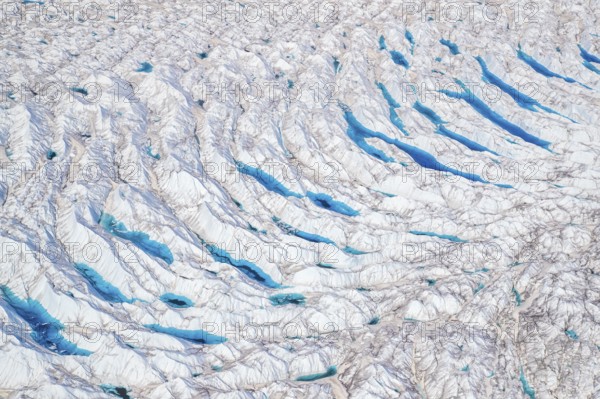Surface meltwater on the Greenland Ice Sheet, visible impact of climate change, Aerial view,