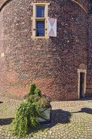 Thief tower, registry office, historic city prison, prison, brick building, façade with windows and