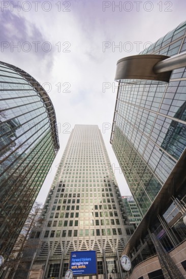 Modern glass buildings soar into the sky, an impressive urban architectural motif, Canary Wharf,