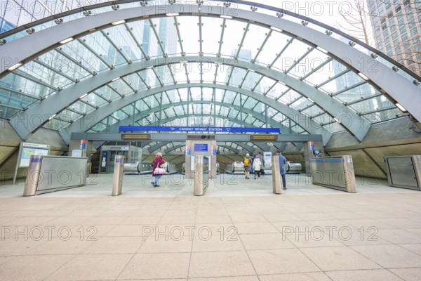 A modern building entrance with a glass roof and deserted escalators, London, England, Great