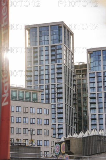 Modern skyscrapers with glass façade in urban surroundings in sunlight, London, England, Great