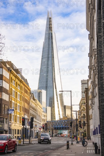 The Shard rises into the blue sky over the streets of London, London, England, Great Britain