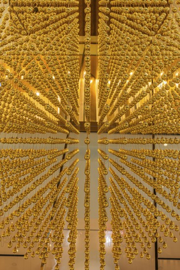 Ornate gilded ceiling decoration in Iconsiam shopping center, Bangkok, Thailand's metropolis,