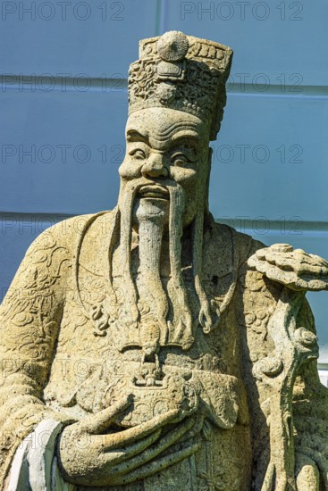 The Grand Royal Palace, mystical stone figure in front of the white pagoda, Phra Nakhon, Bangkok,