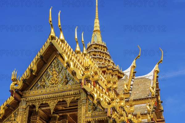 The Grand Royal Palace, the gilded Abhorn Bimok Pavilion with overlapping roofs and curved chofas,