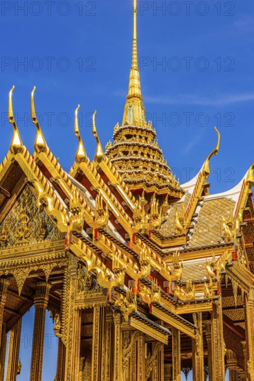 The Grand Royal Palace, the gilded Abhorn Bimok Pavilion with overlapping roofs and curved chofas,
