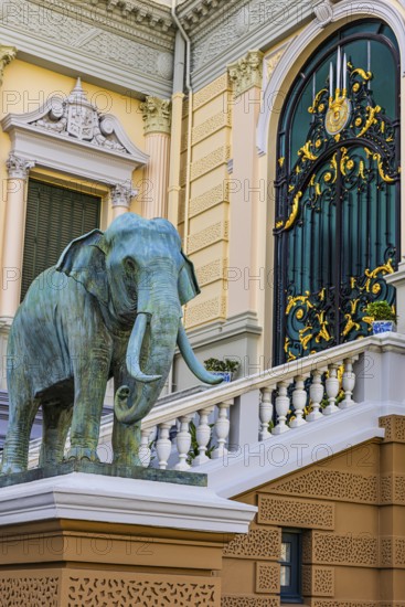 The Grand Royal Palace, an elephant statue adorns the side entrance of the Chakri Maha Prasad