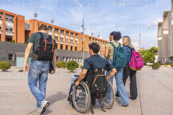 Diverse group of young students, including one in a wheelchair, carrying backpacks and walking