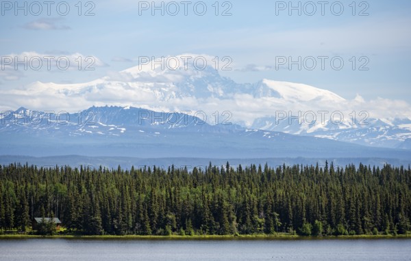 Lake Willow Lake, taiga landscape with high glaciated mountain peak Mount Sanford, Wrangell