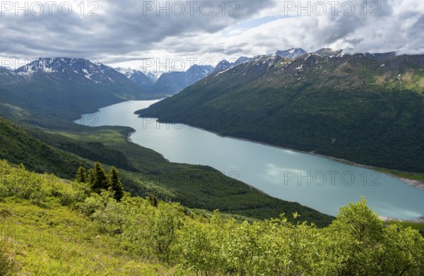 View of blue lake and mountains on Twin Peaks Trail, Eklutna Lake, Chugach Mountains, Chugach State