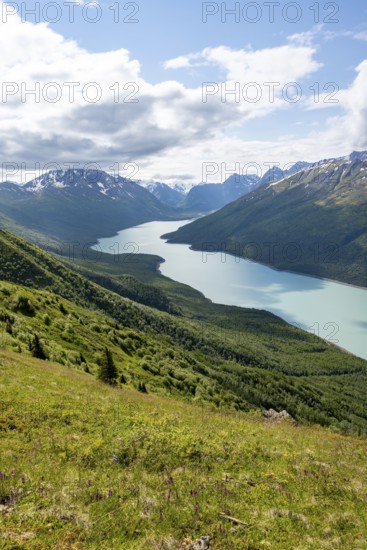 View of blue lake and mountains on Twin Peaks Trail, Eklutna Lake, Chugach Mountains, Chugach State
