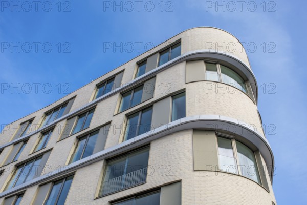 Modern building, detailed view of a residential building, apartment building with large glass