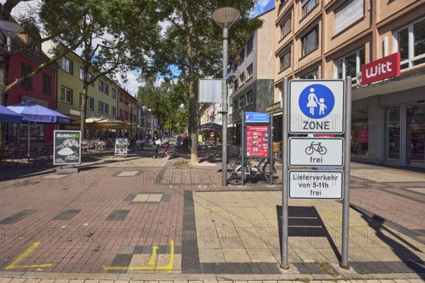 Pedestrian zone, traffic sign pedestrian zone with additional sign bicycles free and delivery