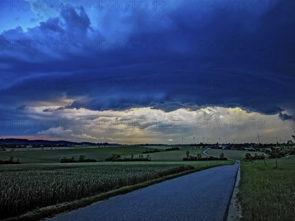 Supercell, approaching thunderstorm with impressive and threatening cloud formation, a thunderstorm