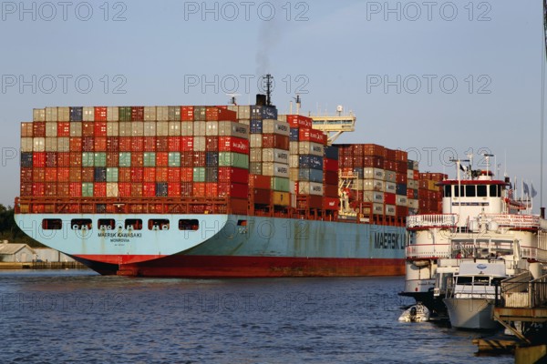 Large container ship on Savannah River, busy harbor area, Savannah, Georgia, USA