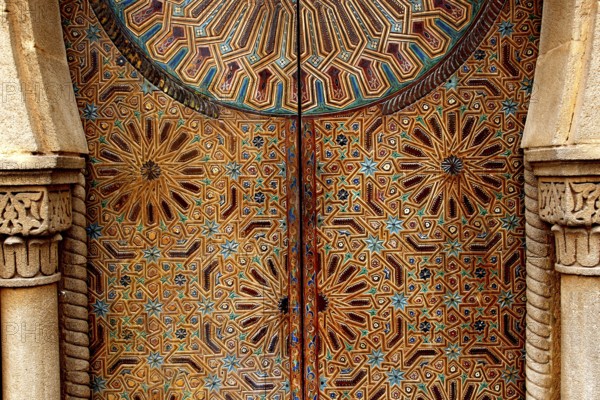 Elaborately decorated door in the Kasbah of Oudaias, Rabat, with detailed patterns,