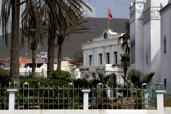 Spanish town hall flanked by palm trees in the old town of Sidi Ifni, Sidi Ifni, Guelmim-Oued Noun