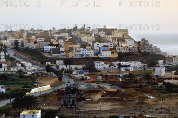 View of the city of Sidi Ifni with densely packed buildings on the coast, Sidi Ifni, Guelmim-Oued