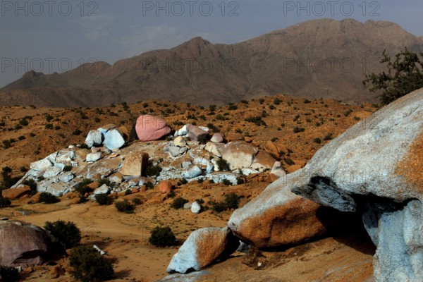 Rocky hills with colour-contrasting stones in the desert area of Tafraoute, Tafraoute, Souss-Massa,