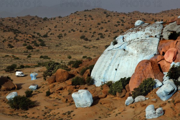Painted rocks in the vast desert landscape of Tafraoute, created by Jean Verame, Tafraoute,